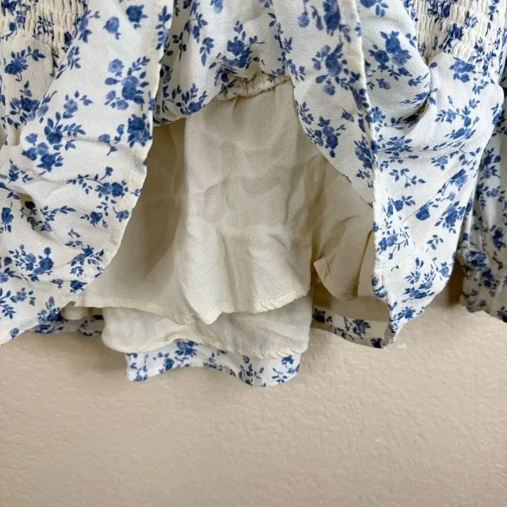 REFORMATION Braelyn Top Blue White Smocked Floral Pull On Spring Women’s Sz L
